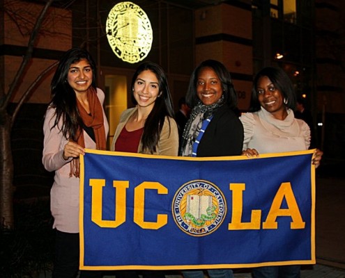 students holding UCLA banner